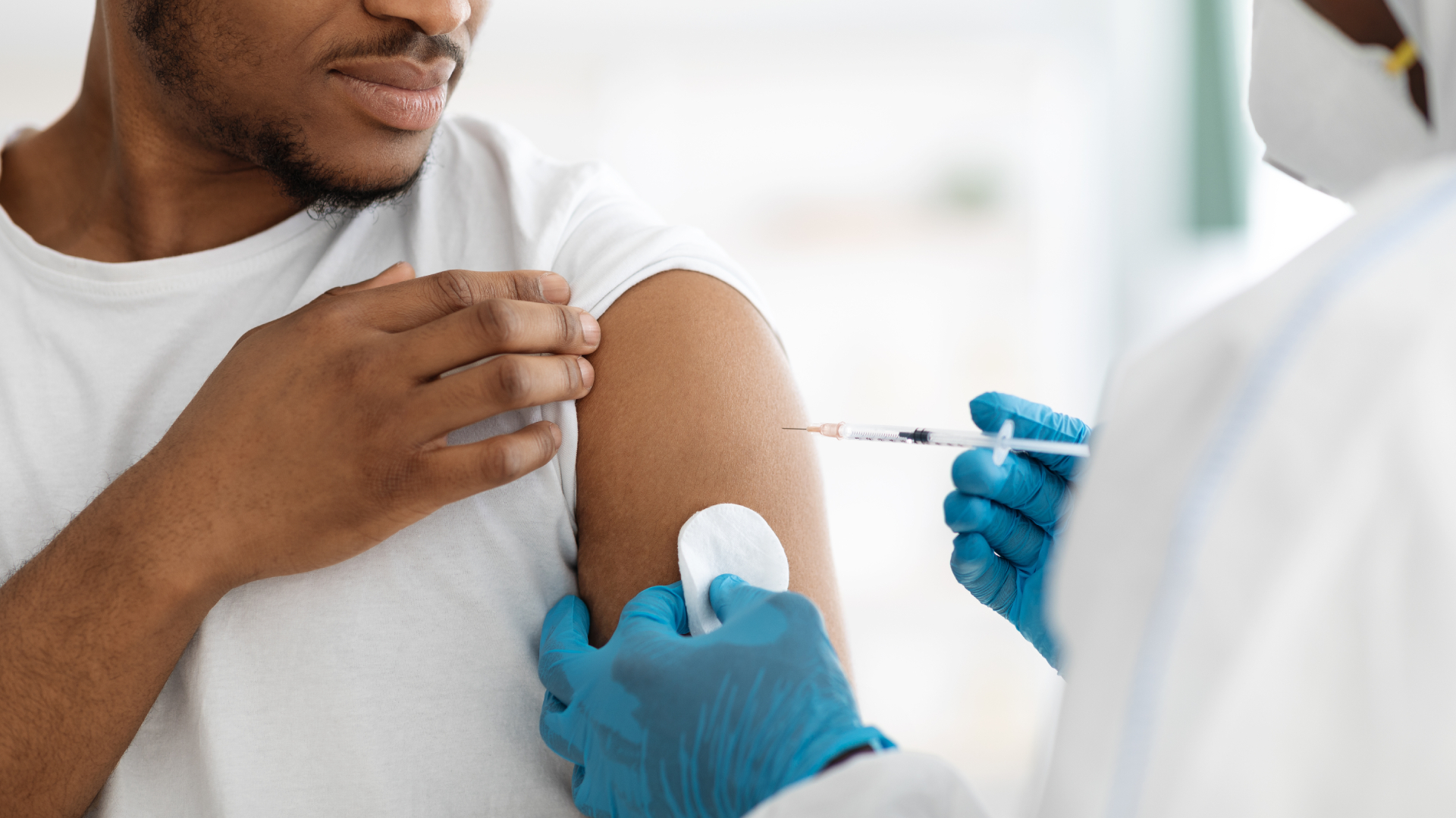 Man getting COVID vaccine