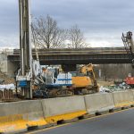 Renovation bridge construction site on reconstruction of the bridge of a modern road interchange in US