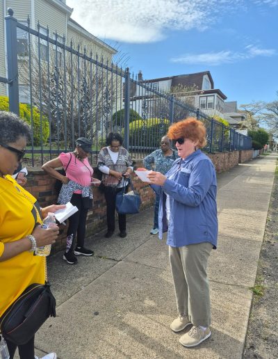 looking at plan at bus stop 4.14.26
