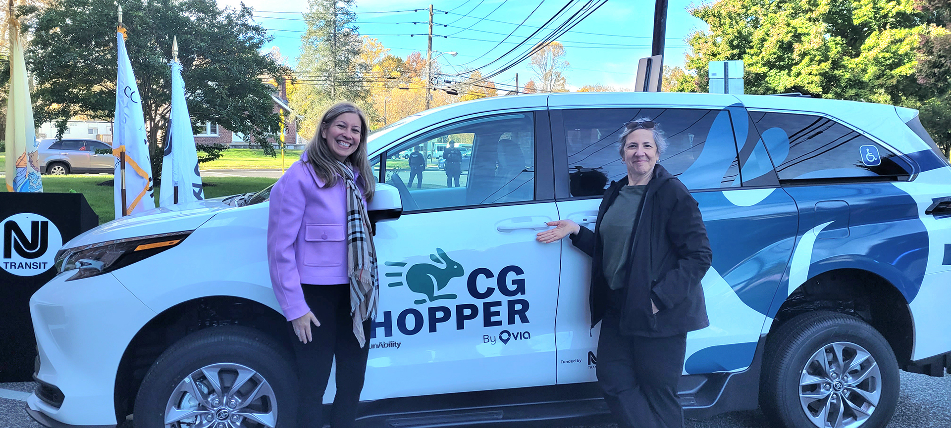 Microtransit_AL-SD VTC researchers Andrea Lubin and Stephanie DiPetrillo with a CG Hopper vehicle at the launch of the South Jersey microtransit pilot. Their research on cross-county mobility helped inform the development of the service.